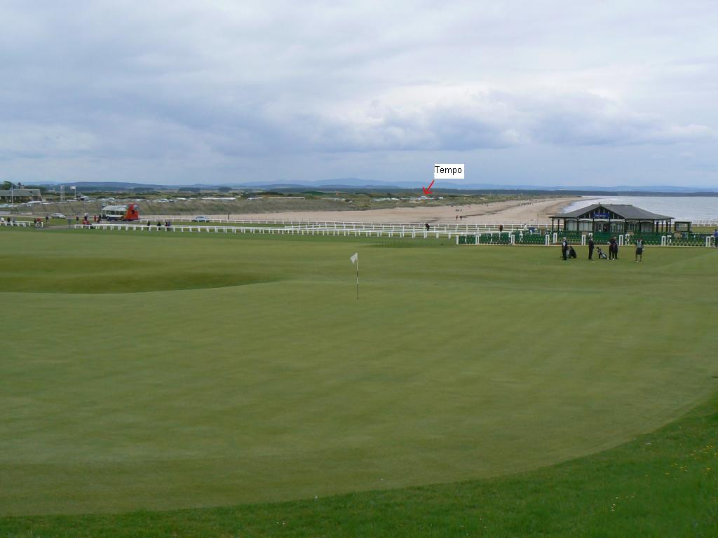 The 18th green, the 1st tee, and Tempo in the distance